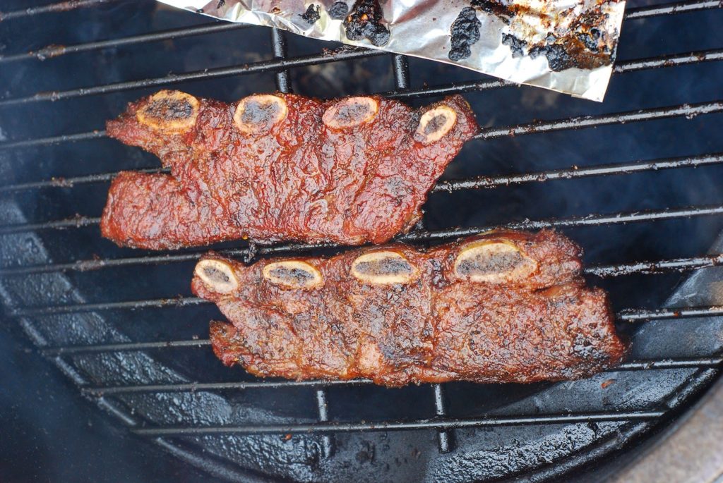 The same two Flanken ribs; marinated, slow BBQ'd and ready to glaze.